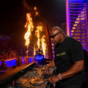 Gqom DJ performing in a Durban nightclub, capturing the raw, dark energy of South African electronic music culture