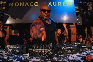 Monaco Laurèn performing Afrobeats live, redefining the genre with refined production, cultural depth, and global stage presence.