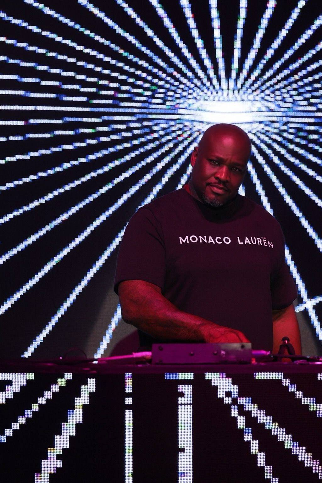 What Is Indo House Music? 7 Powerful Ways This Global Fusion Sound Is Changing the World 2 Monaco Lauren performing an Indo House DJ set, blending Indian instruments and electronic beats to embody what is Indo House music—a global fusion of culture and rhythm.